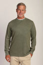 man wearing long sleeve crew in green 
