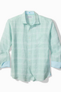 Light blue checkered shirt with rolled-up sleeves on a white background