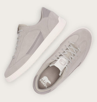 Gray sneakers with white sole on a light gray background